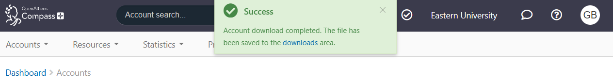 'Success' message, displayed as an overlay on the accounts list page. It reads, 'Account download complete. The file has been saved to the downloads area.'